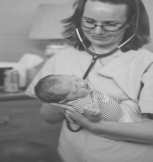 midwife-holding-baby