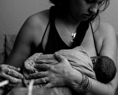 nursing-mother Black and white picture of a nursing mother.